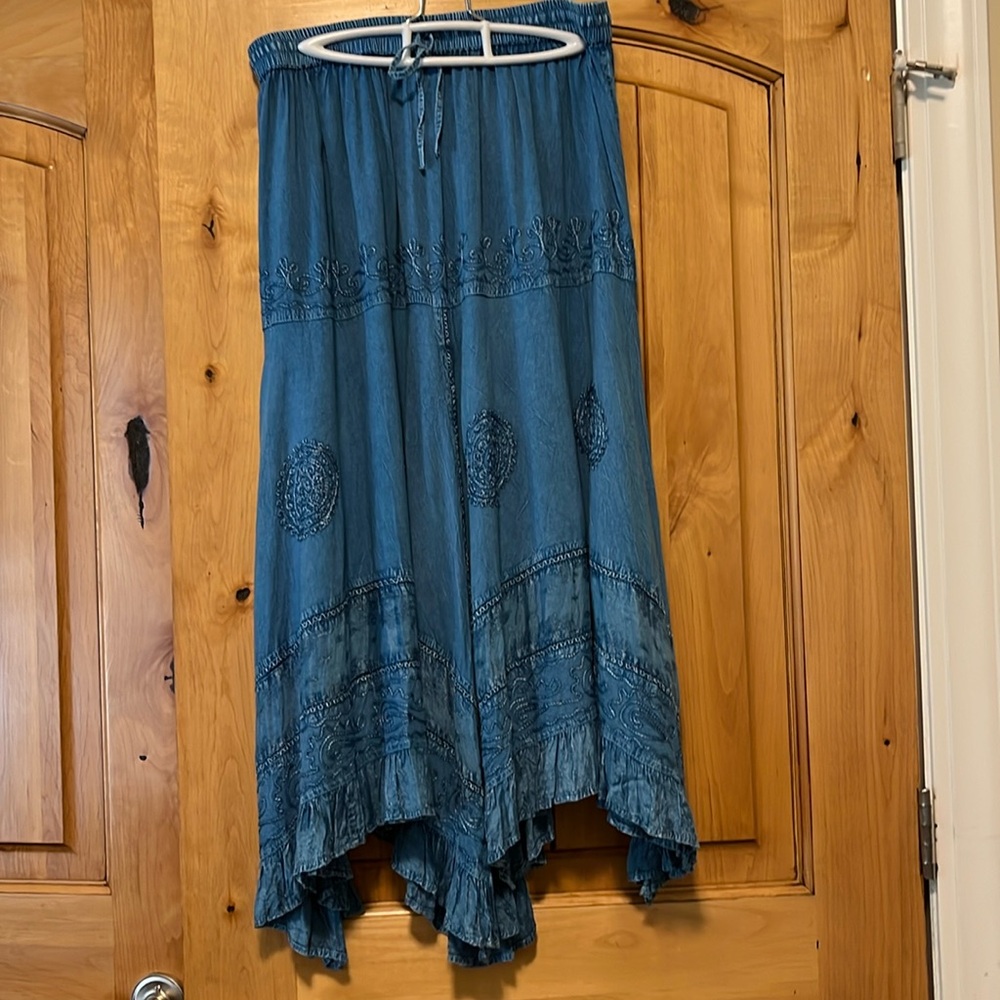 Beautiful, never worn, stylish skirt with amazing embroidery.
